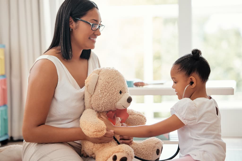 Pediatric home nursing nurse with child